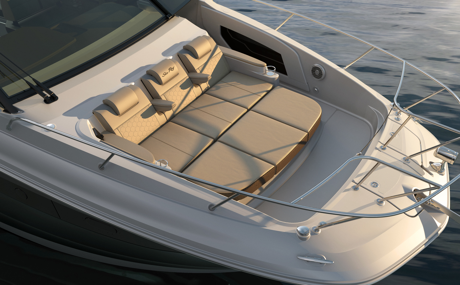 Guests relaxing on the bow sunbed of the yacht under the Mediterranean sun