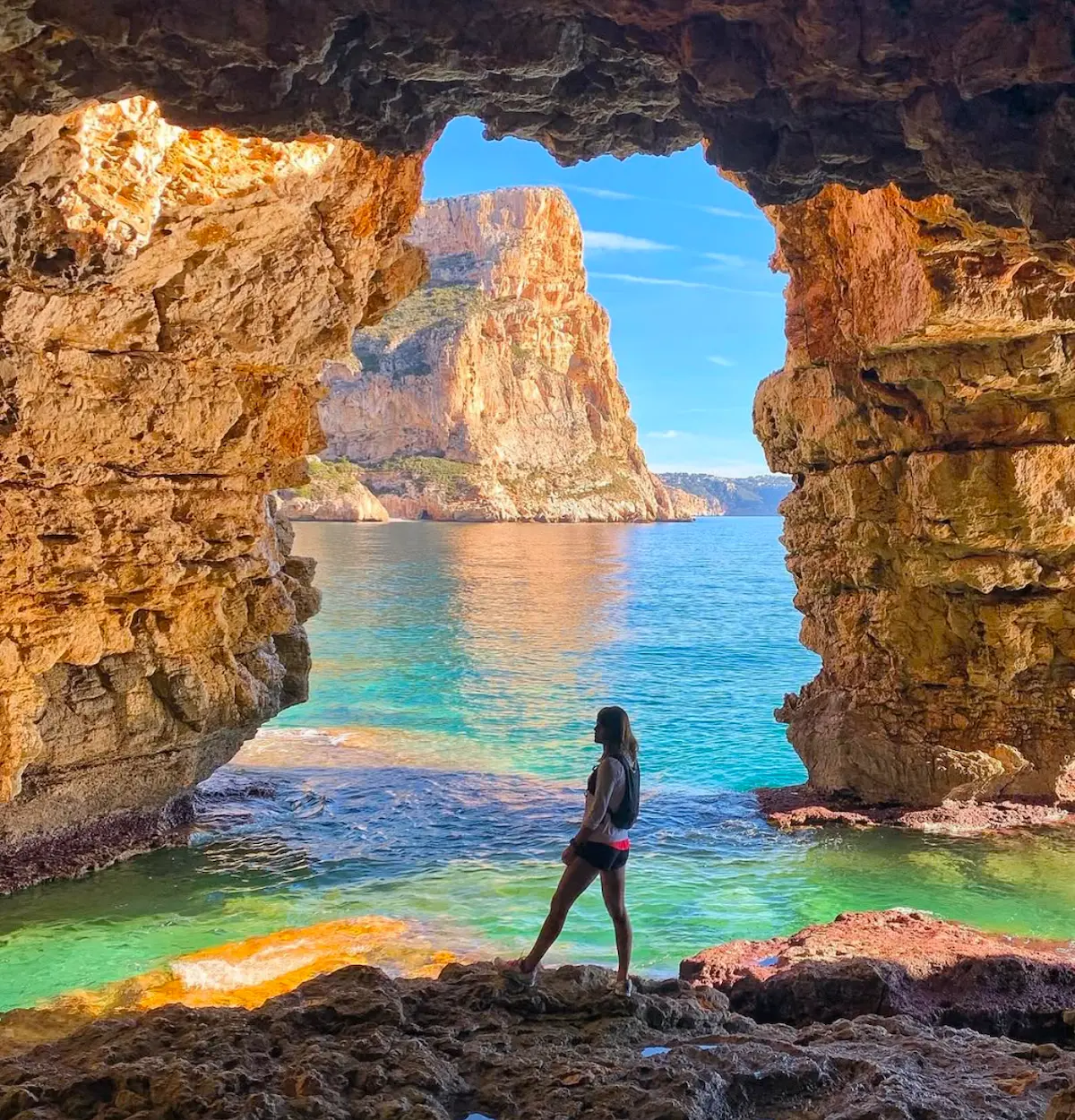 Sea cave on the Costa Blanca opening onto turquoise water